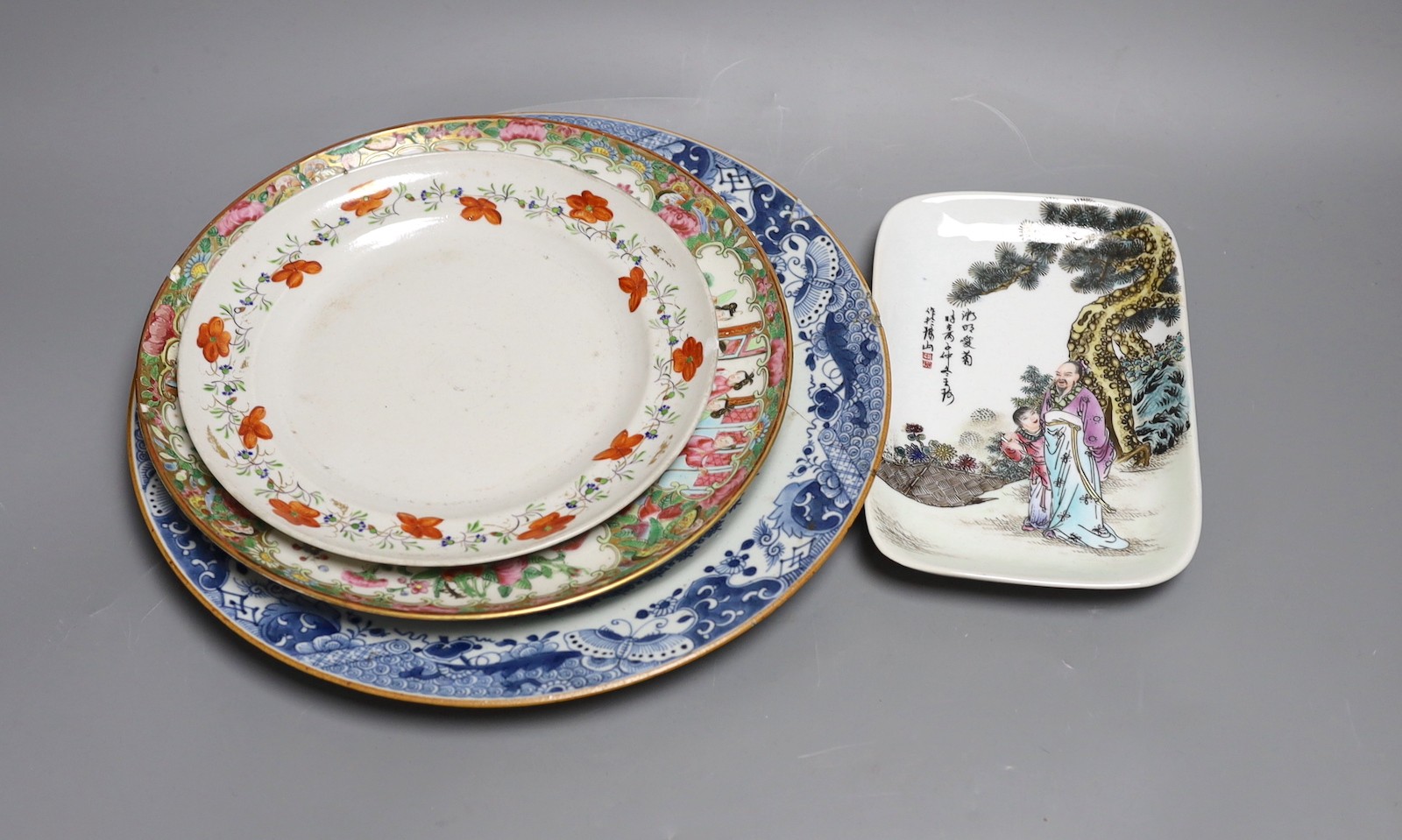 Four 18th / 19th century Chinese plates, and a later dish, largest plate 29 cms diameter
